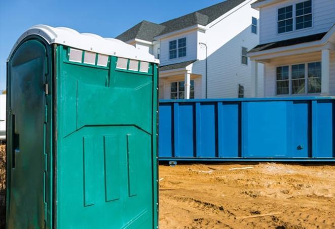 clean and efficient portable toilets available for workers at a work site